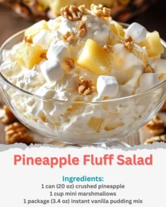 A bowl of Pineapple Fluff Salad with pineapple chunks and whipped topping.