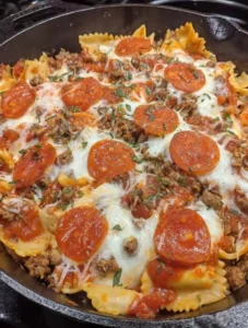 Pizza Lasagna Skillet Bake featuring layers of pizza and lasagna flavors