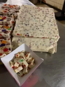 Delicious popular Christmas bars with festive decorations and toppings