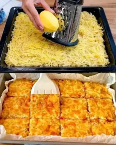 Golden brown Potato and Cheese Squares served on a plate