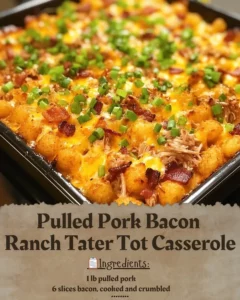 Delicious pulled pork bacon ranch tater tot casserole topped with cheese
