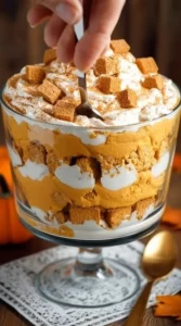 Delicious Pumpkin Cheesecake Trifle with layers of pumpkin and cheesecake filling