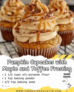 Pumpkin cupcakes with creamy maple and toffee frosting on a rustic wooden table.