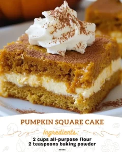 Deliciously spiced Pumpkin Square Cake on a rustic wooden table
