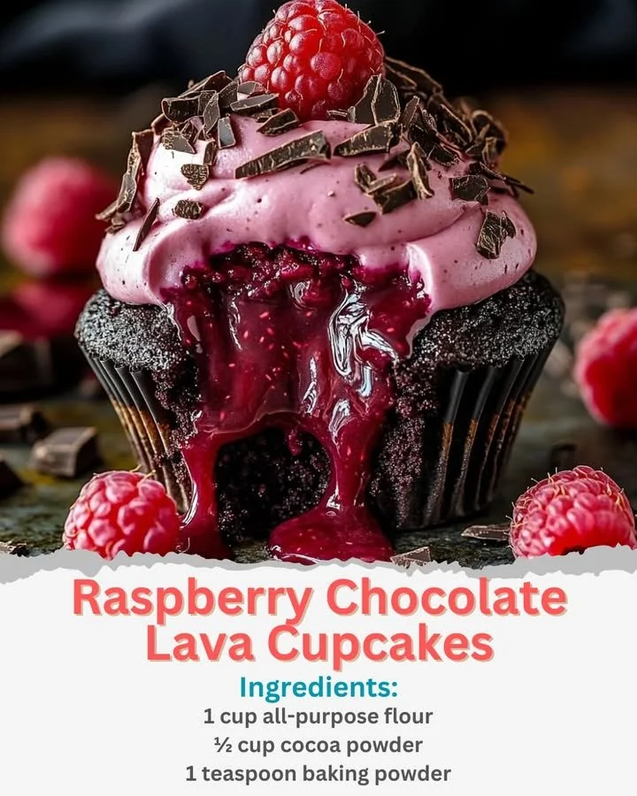 Raspberry chocolate lava cupcakes with molten chocolate filling and fresh raspberries.