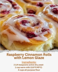 Delicious Raspberry Cinnamon Rolls with Lemon Glaze on a plate