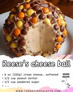 Reese's Cheese Ball topped with chocolate and peanut butter treats