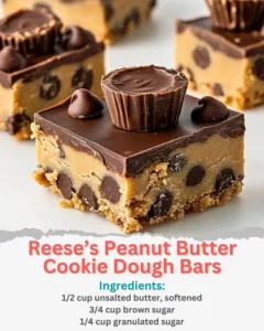 Delicious Reese's Peanut Butter Cookie Dough Bars topped with chocolate.