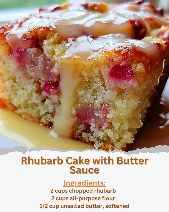Slice of rhubarb cake topped with rich butter sauce on a white plate