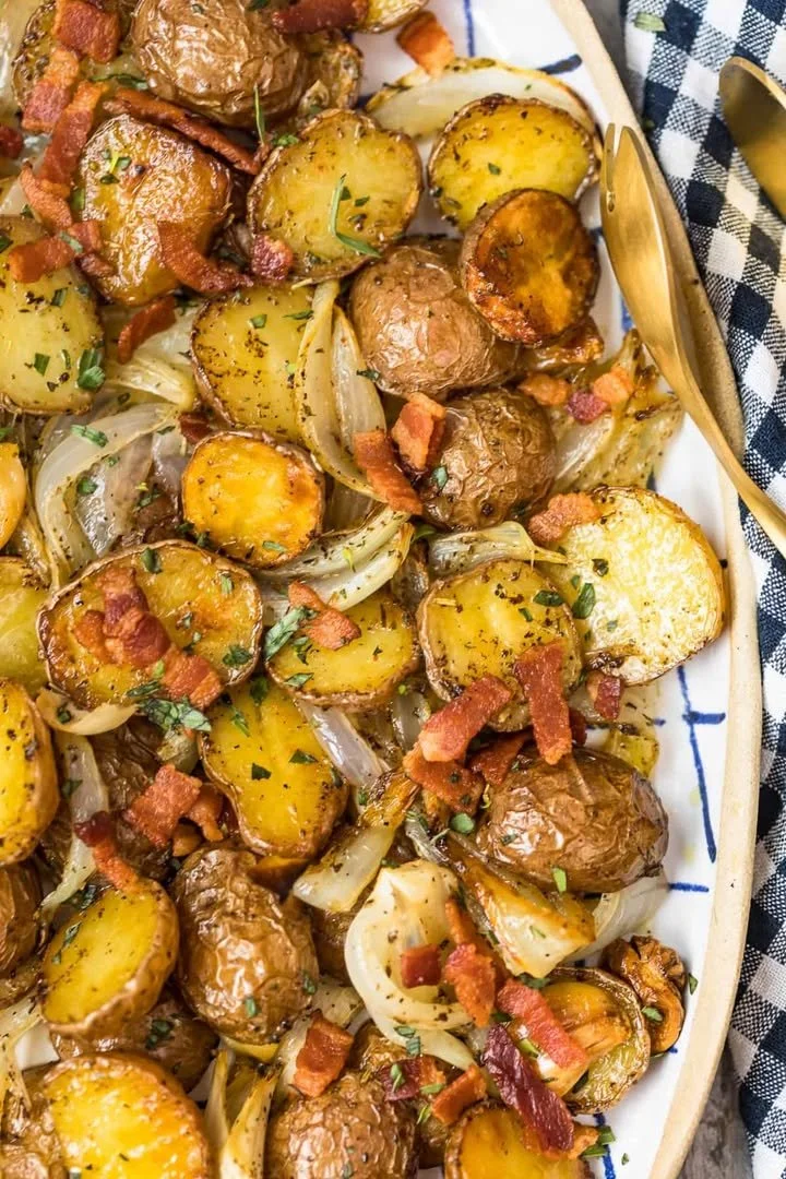 Roasted red potatoes with bacon and onion served as a savory dish