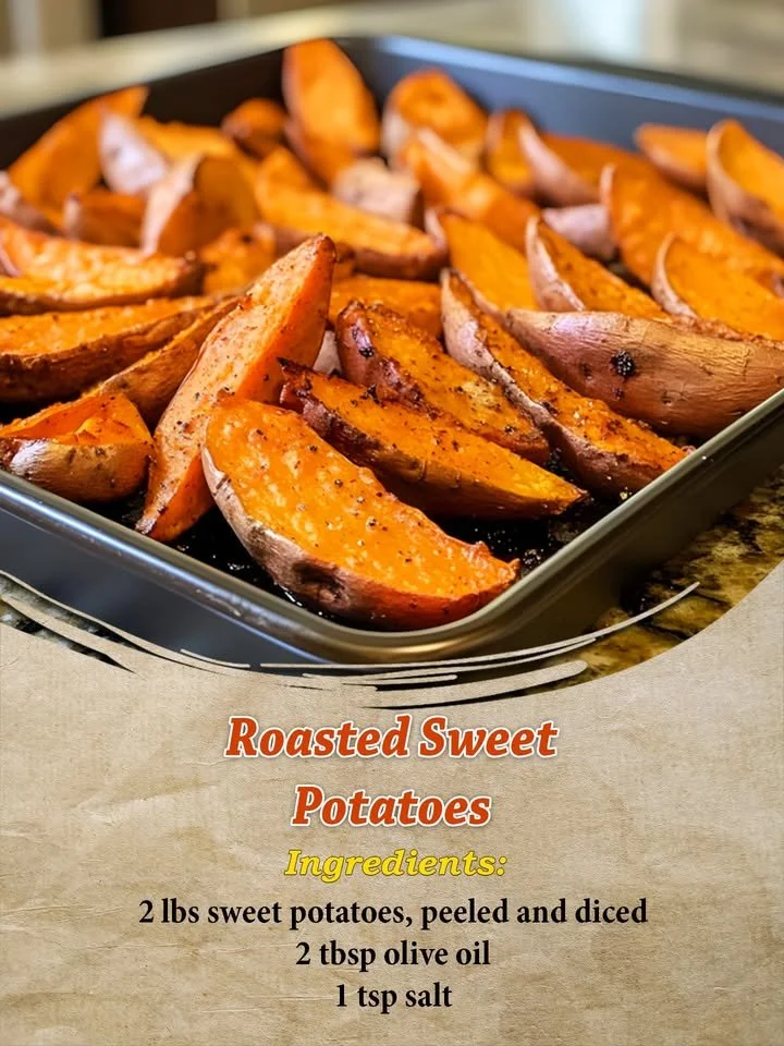Bowl of roasted sweet potatoes seasoned with herbs and spices