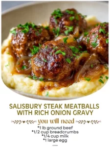 Delicious Salisbury steak meatballs with rich onion gravy on a plate