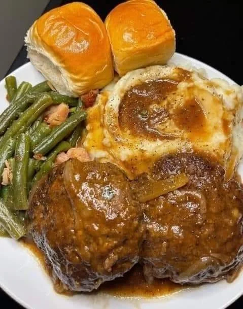 Salisbury Steak with savory onion gravy on a plate