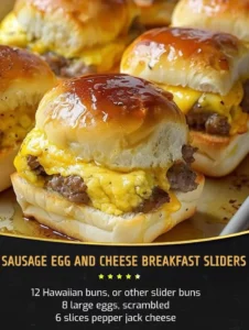Sausage Egg and Cheese Breakfast Sliders on a wooden plate served with condiments