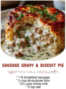Sausage Gravy & Biscuit Pie served on a plate with a side of greens