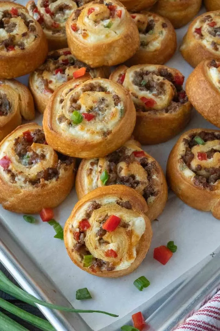 Delicious sausage pinwheels appetizer on a serving platter