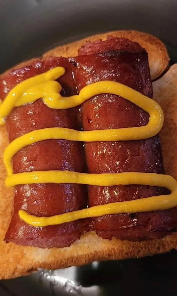 Delicious sausage sandwich with fresh toppings and savory flavors