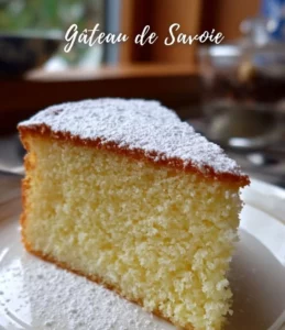 Delicious Savoie Cake with a light and fluffy texture on a rustic table.