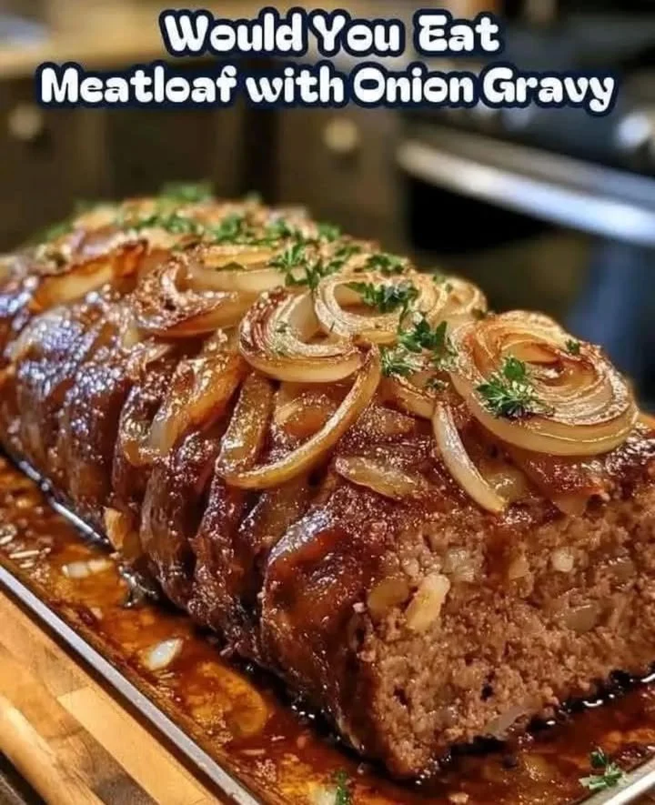 Savory meatloaf with caramelized onion gravy on a plate