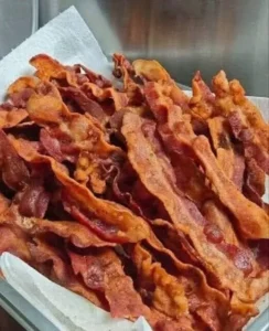 Crispy bacon seasoned to perfection for delicious breakfast results.