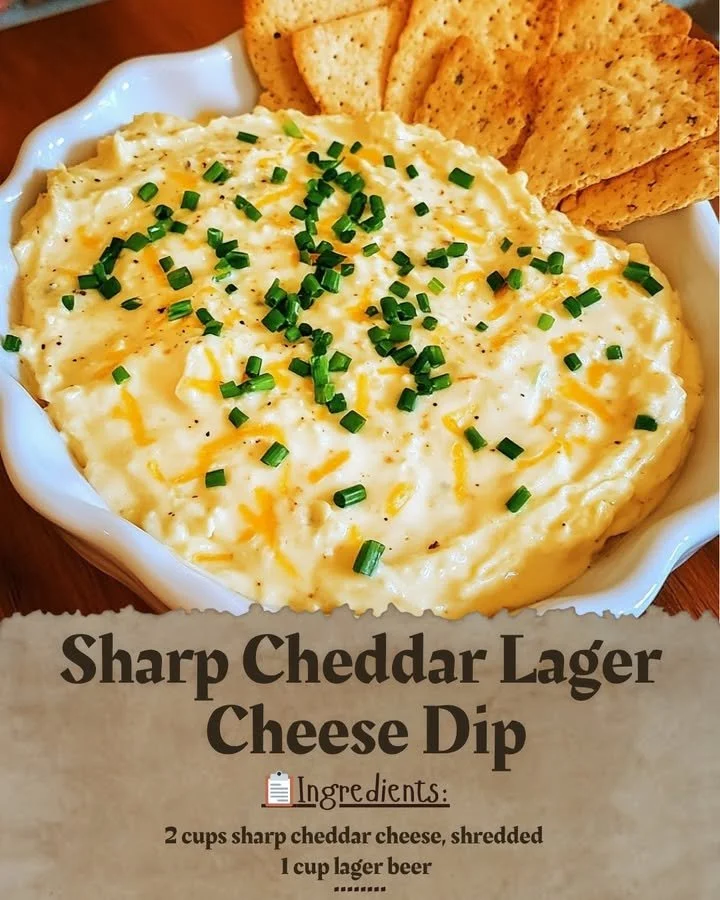 Sharp Cheddar Lager Cheese Dip served in a bowl with tortilla chips
