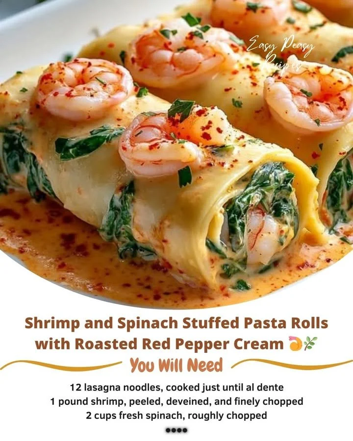 Shrimp and spinach stuffed pasta rolls with roasted red pepper cream sauce.