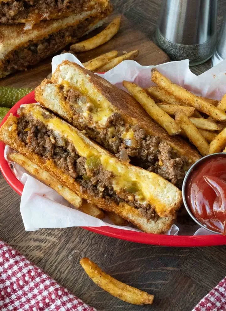 Delicious Sloppy Joe Grilled Cheese sandwich with melted cheese and savory sloppy joe filling.