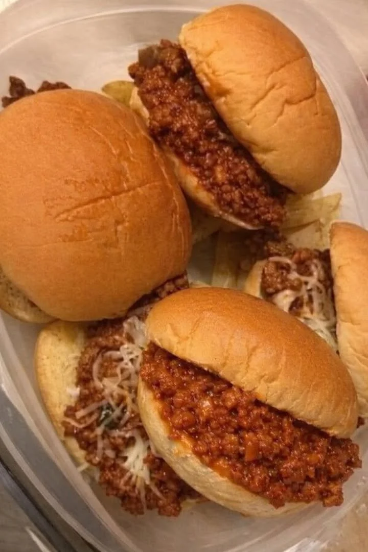 Delicious Sloppy Joe sandwich topped with beef and served on a bun