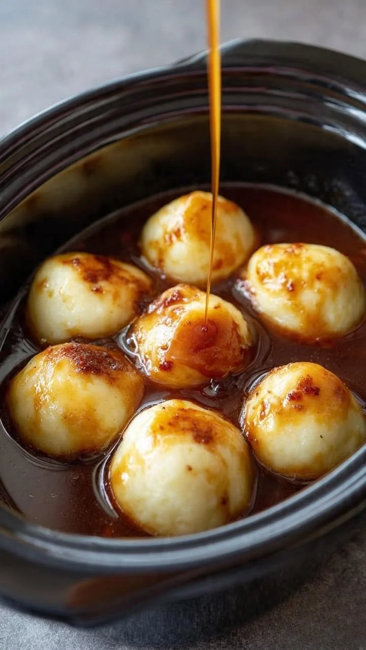 Delicious Slow Cooker Amish Winter Spice Dumplings served warm in a bowl.