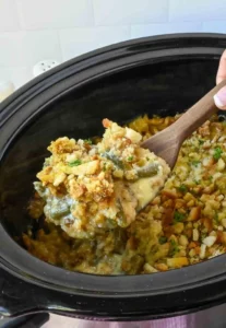 Delicious slow cooker chicken stuffing casserole topped with golden, crispy stuffing.