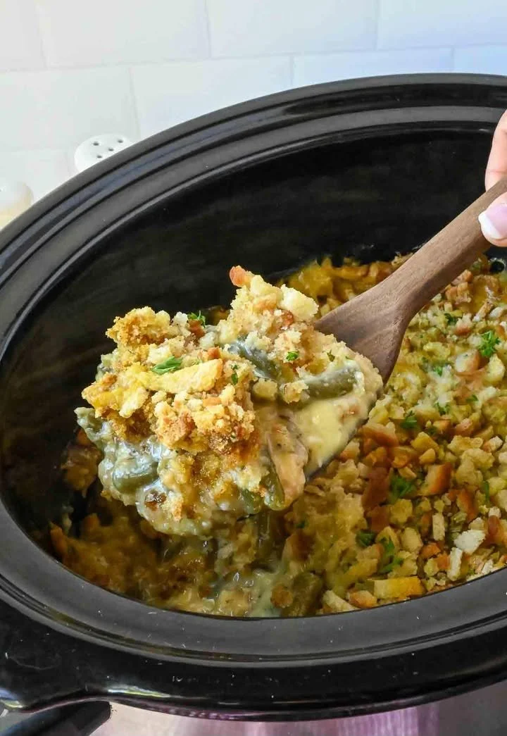 Delicious slow cooker chicken stuffing casserole topped with golden, crispy stuffing.