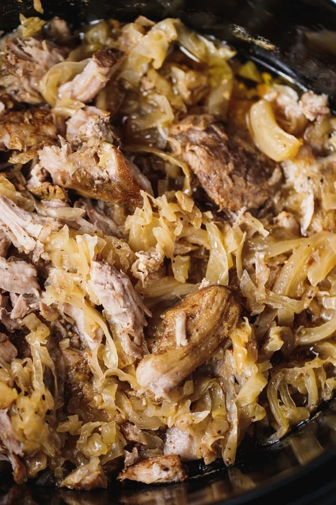 A tasty slow cooker pork and sauerkraut dish served in a bowl