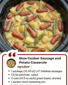 Slow Cooker Sausage and Potato Casserole in a bowl with fresh herbs