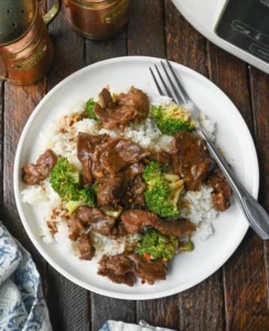 Delicious slow cooker teriyaki beef and broccoli served in a bowl