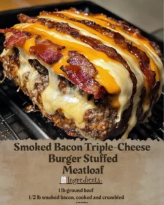 Smoked Bacon Triple-Cheese Burger Stuffed Meatloaf with melted cheese and crispy bacon