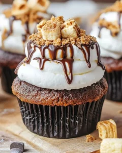 Delicious S'mores Cupcakes topped with marshmallow and chocolate frosting