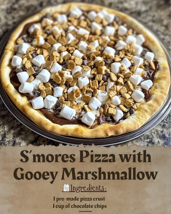 Delicious S’mores Pizza topped with gooey marshmallows and chocolate