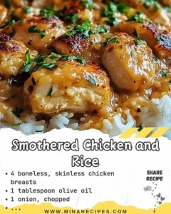 Plate of smothered chicken served with rice and gravy