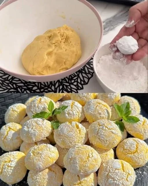 Freshly baked soft lemon biscuits on a cooling rack