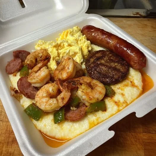 Southern Breakfast Shrimp & Grits Plate with Sausage and Eggs