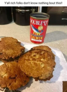 Southern fried salmon patties crispy and golden brown on a plate