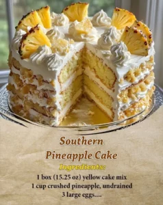 Delicious Southern Pineapple Cake topped with fresh pineapple slices and whipped cream.