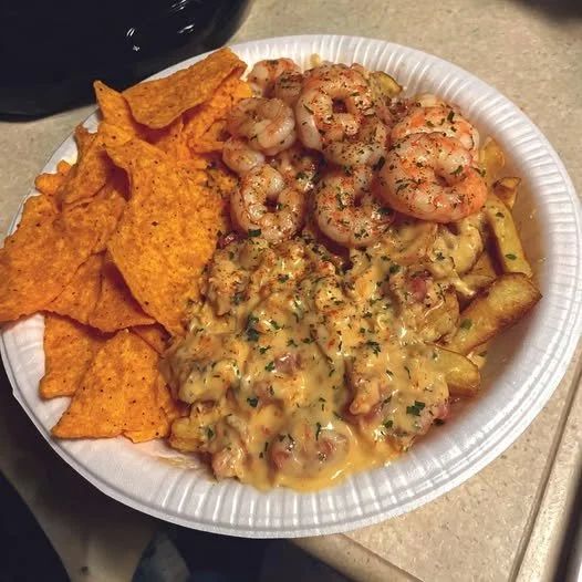 Southern shrimp-loaded Dorito fries topped with shrimp and cheese