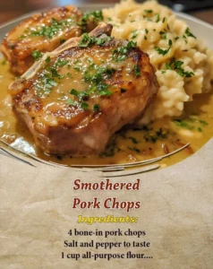 Southern-Style Smothered Pork Chops in rich gravy on a plate