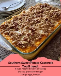 Delicious Southern sweet potato casserole topped with marshmallows and pecans