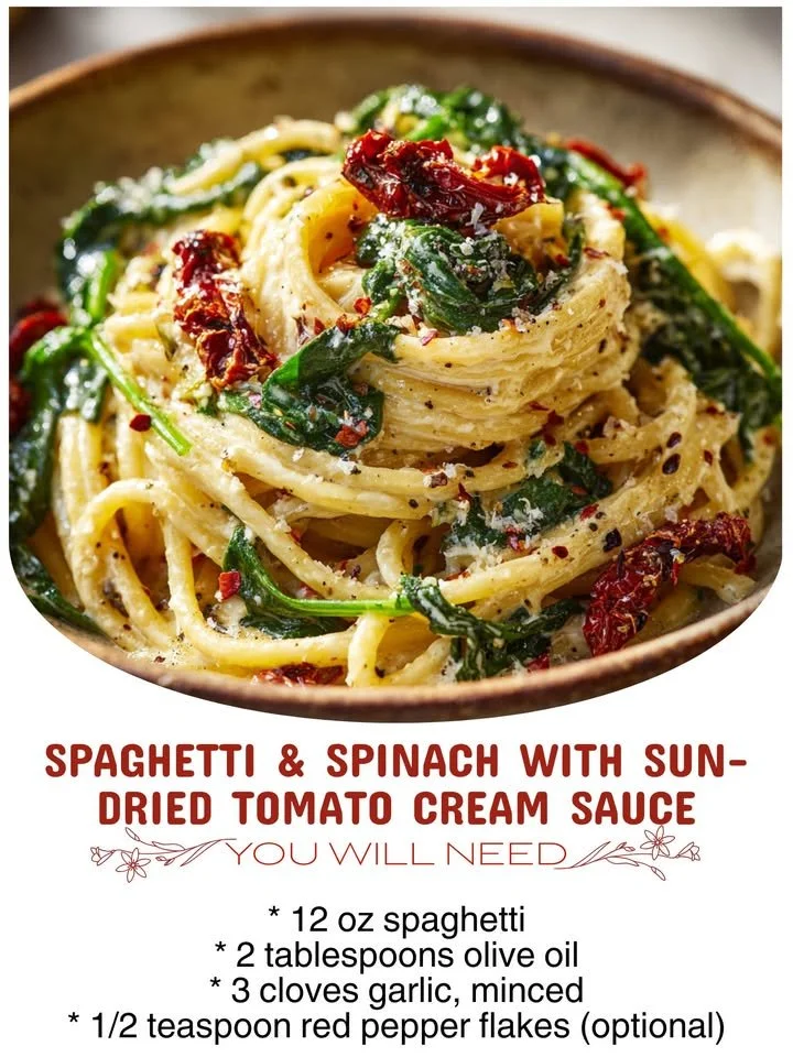 Spaghetti with spinach and sun-dried tomato cream sauce in a bowl