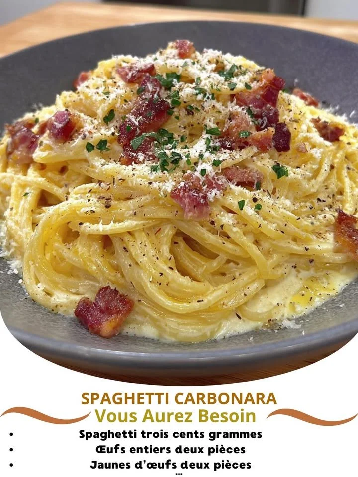 Delicious plate of Spaghetti Carbonara garnished with parsley and cheese.