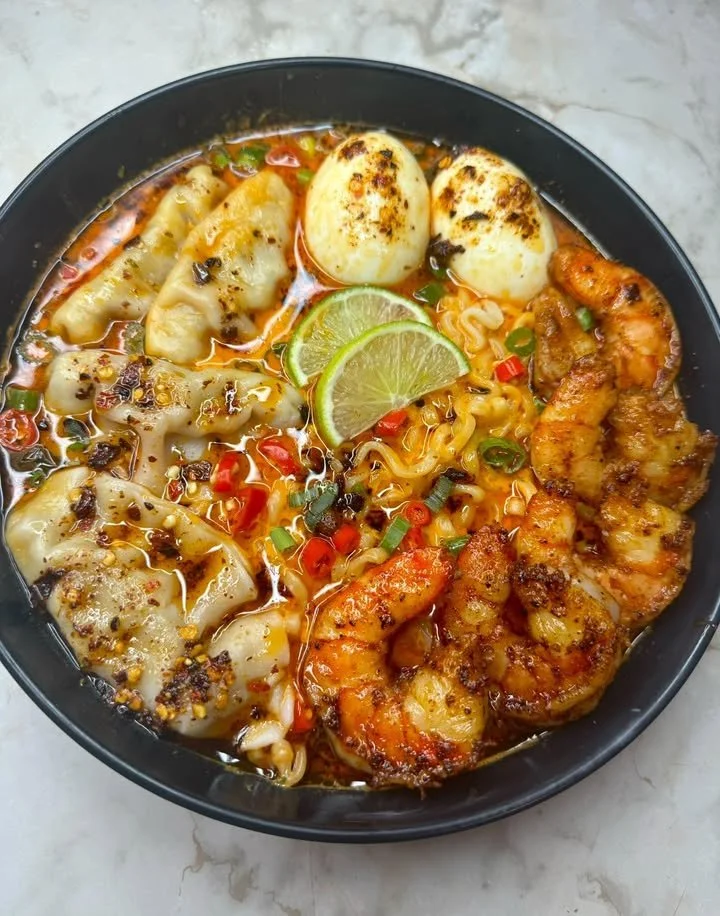 Spicy Shrimp & Dumpling Noodle Soup with vibrant ingredients and delicious garnishes