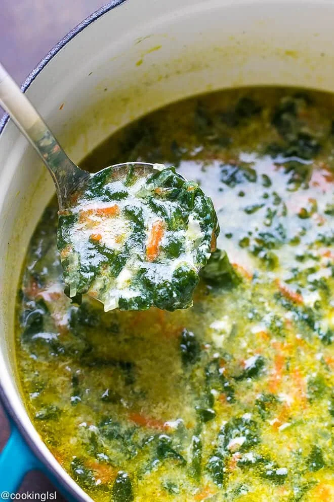 Bowl of Spinach Egg Drop Soup with fresh spinach and eggs