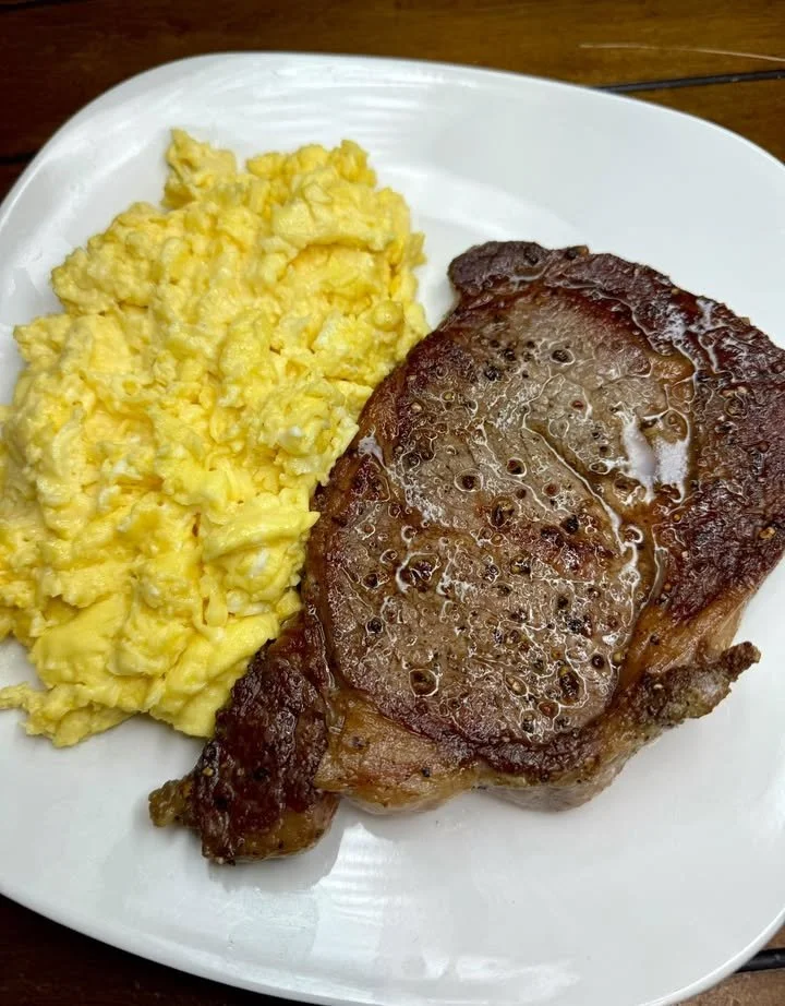 Delicious plate of steak and eggs served for a hearty breakfast